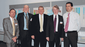 Resources Minister, Ian Macfarlane, MP, (centre) with Geoscience Australia staff (left to right): Dr John Kennard, Dr Clinton Foster, Dr Neil Williams, and Andrea Cortese.  (Copyright Geoscience Australia 2007)