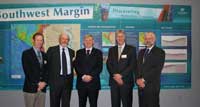 Figure 1. The Minister for Resources and Energy, The Hon. Martin Ferguson AM MP (centre) with (from left) Dr Peter Moore, Executive Vice President, Exploration, New Ventures, Mergers and Acquisitions, Woodside Energy Ltd, Dr Clinton Foster, Chief of Geoscience Australia's Petroleum and Marine Division, Dr Chris Pigram, Acting CEO of Geoscience Australia and Dr Bruce Goleby, Chief Geophysicist and Group Leader, Geoscience Australia, following the release of the Southwest Margin Data Package on 14 April. 
