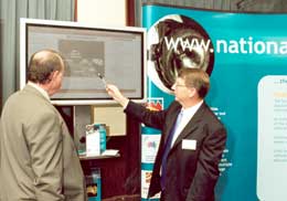 On the right is Dr Bill McKay, Mineral Resources and Advice, Geoscience Australia, with Parliamentary Secretary, Warren Entsch at the launch