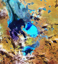 Lake Eyre water flooding onto the dry salt pan (image captured 6 April 2000)