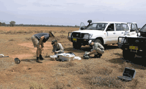 Geoscience Australia's geochemical survey team (from left: Andrew McPherson, Megan Lech and Patrice de Caritat) collecting surface and ~80 cm deep samples at a site in northwestern New South Wales (Image copyright GA 2007).