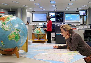 Locating earthquakes on paper maps