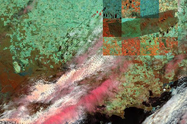 Artistic treatment of abstract image showing pink cloud as captured by satellite