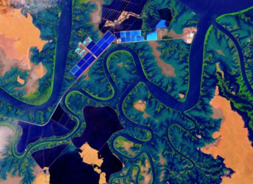 Satellite image showing blue wiggling river and green landscape