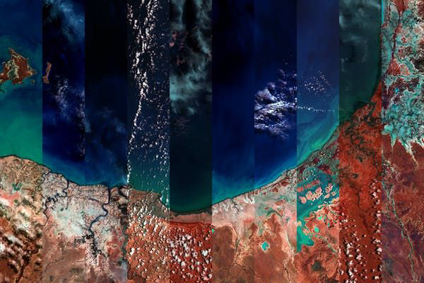 Abstract image showing strips of coastal landscape and cloudcover as captured by satellite